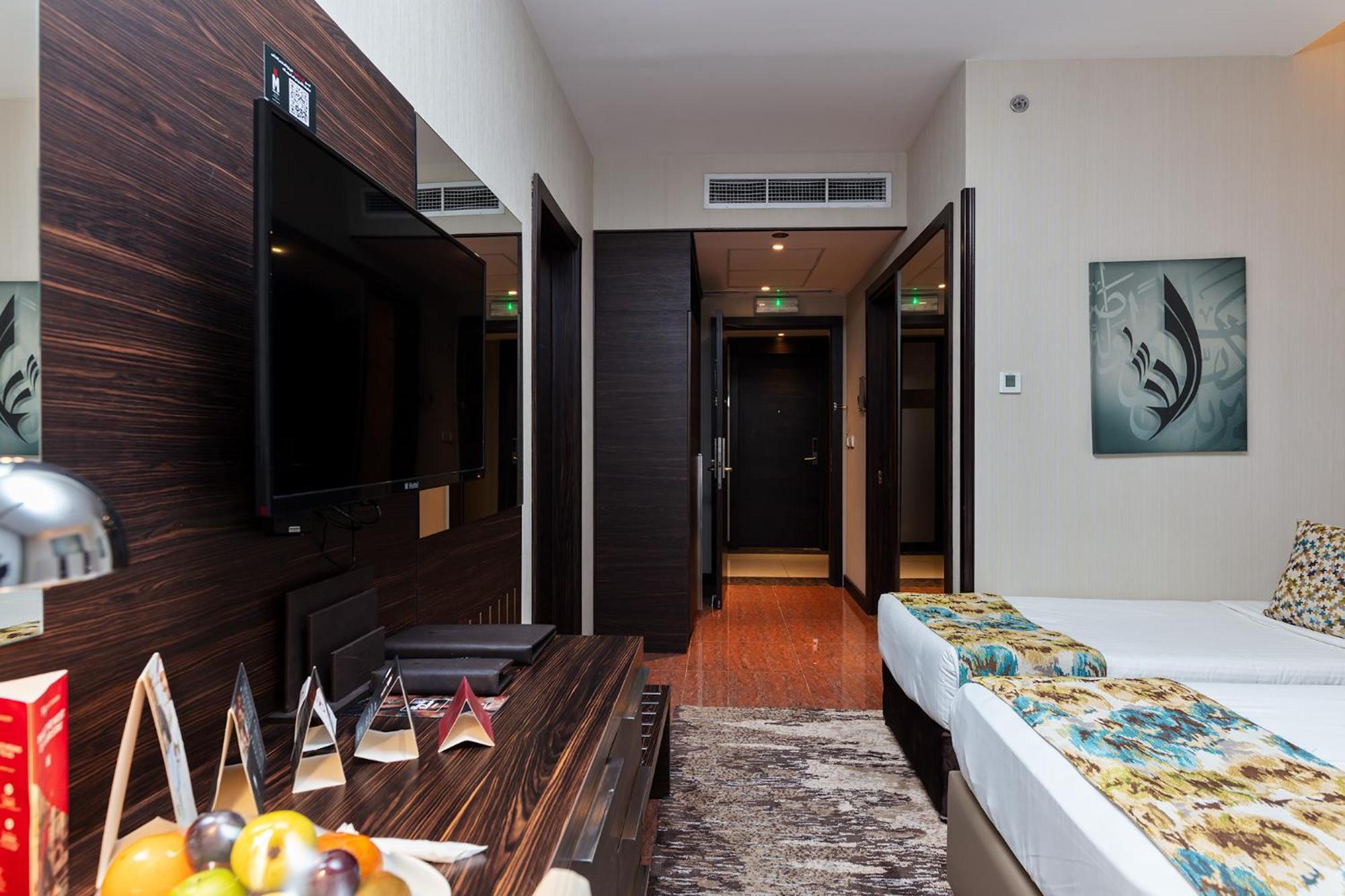 m hotel makkah by millennium contact number